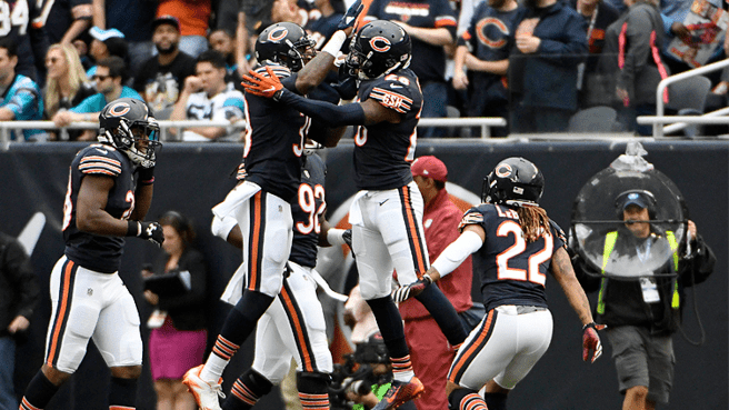 Chicago Bears teammates jump in celebration