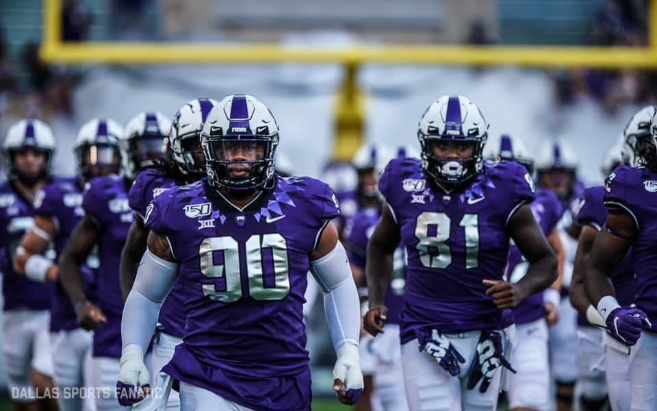 TCU Horned Frogs players emerge from tunnel prior to the start of the game