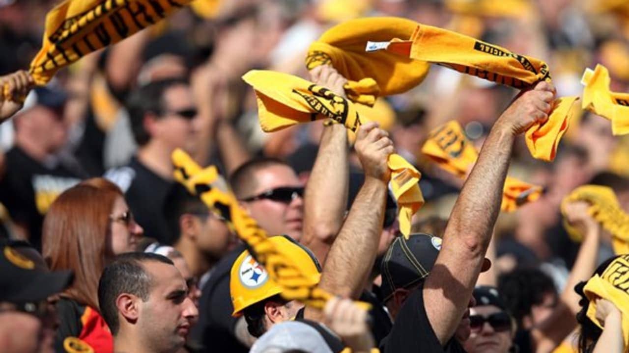 Pittsburgh Steelers fans wave their Terrible Towels